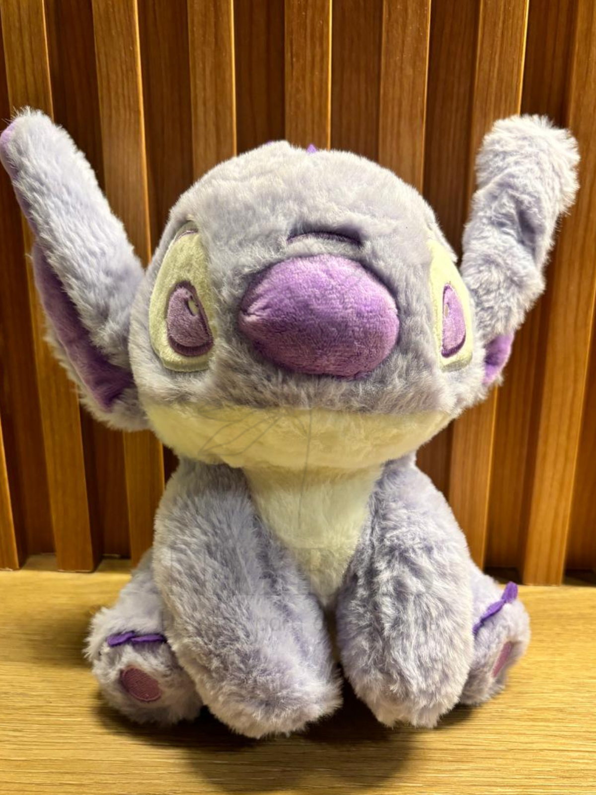 STITCH SENTADO LILA